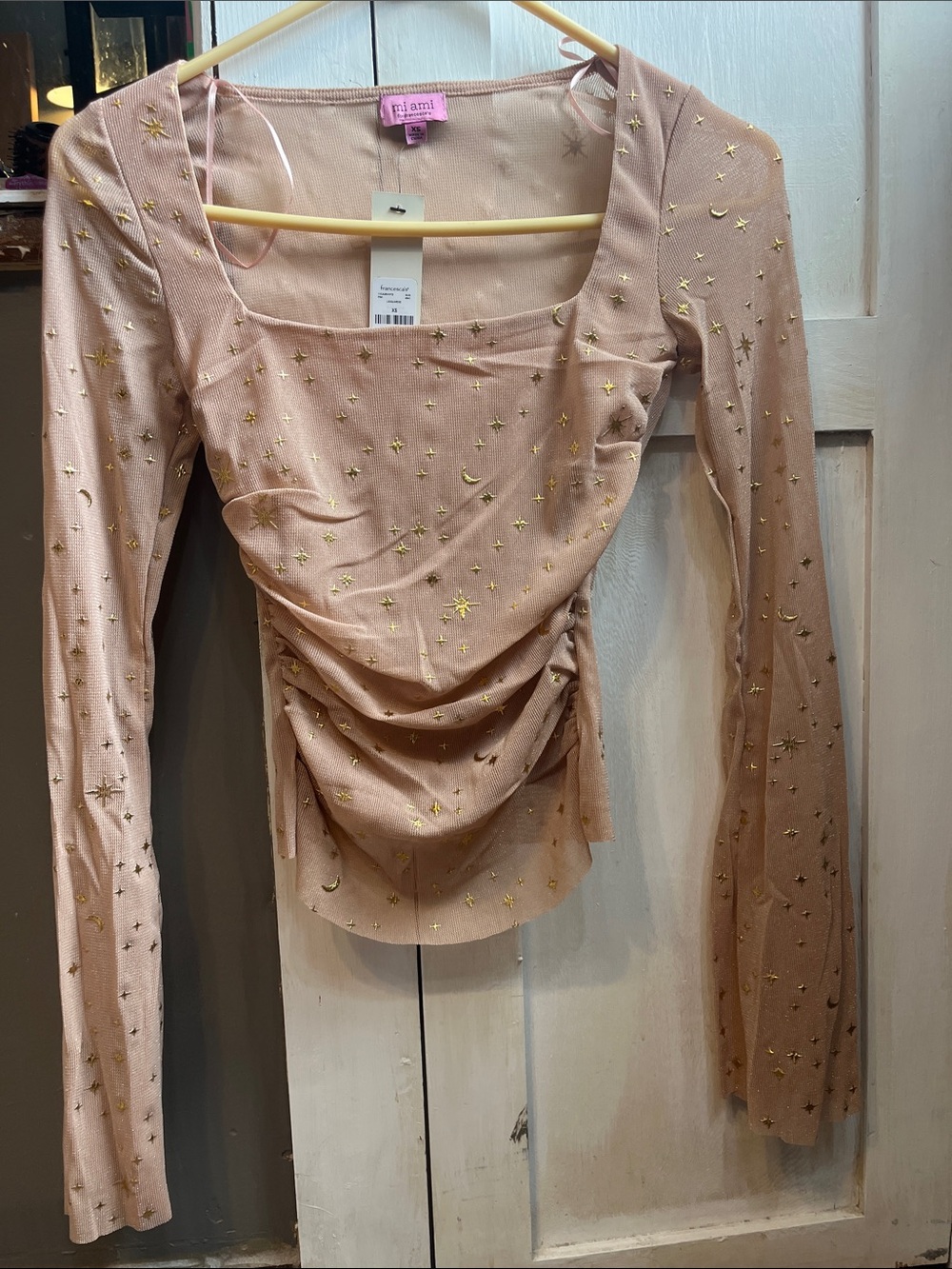 Francesca’s long sleeve mesh top